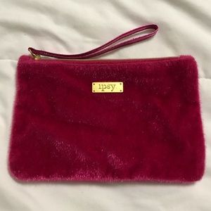 Pink fuzzy Ipsy makeup bag